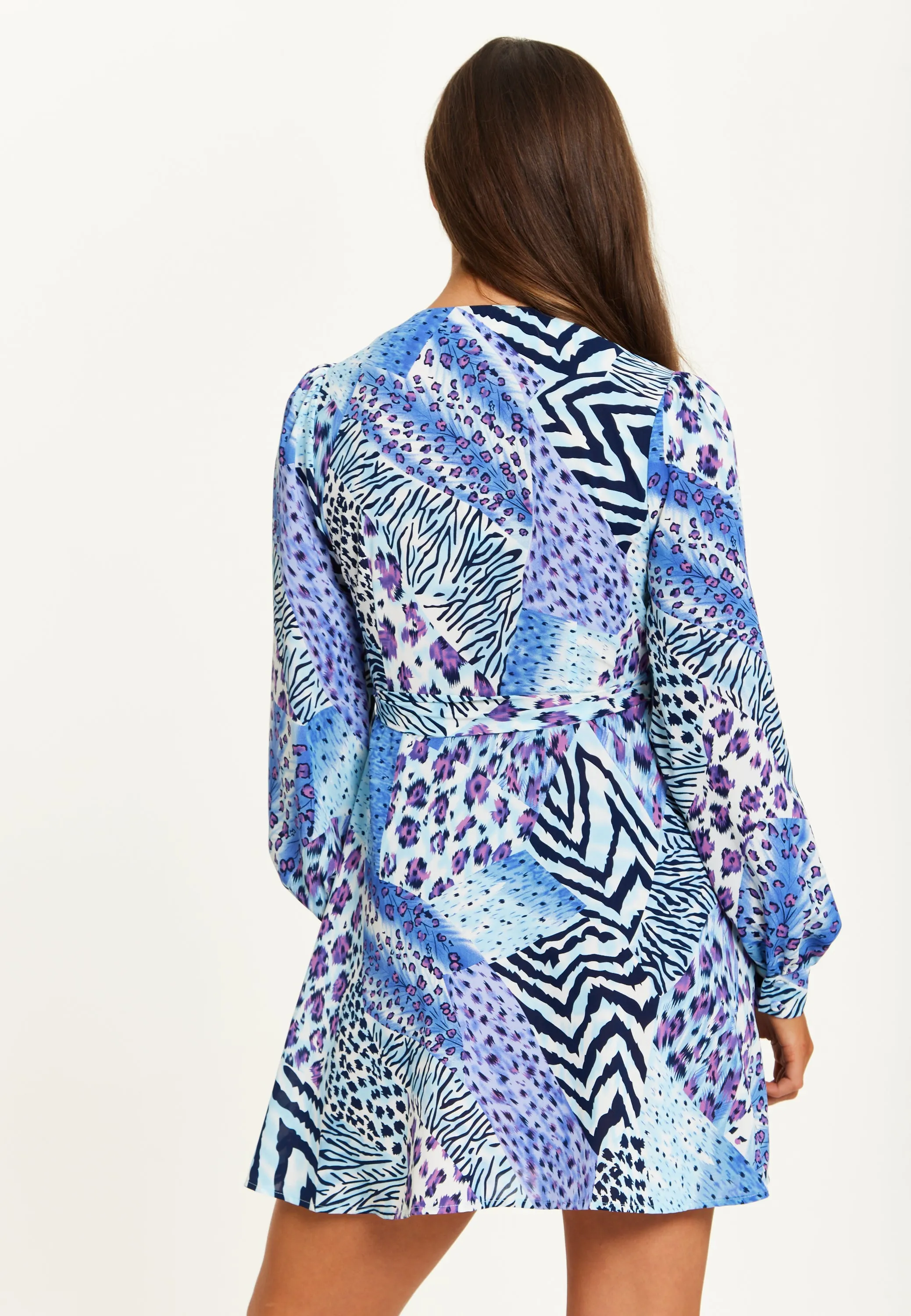 Women's Mini Dress in Blue with Long Sleeves and Mixed Animal Print Wrap Design - Liquorish